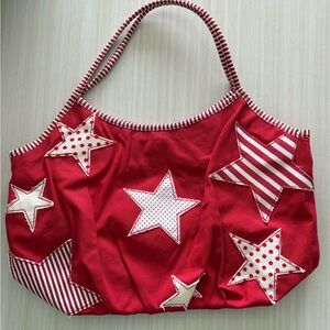 Red Striped Trim purse with stars.